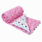 folder pink and white comforter for kids, showing reversible prints