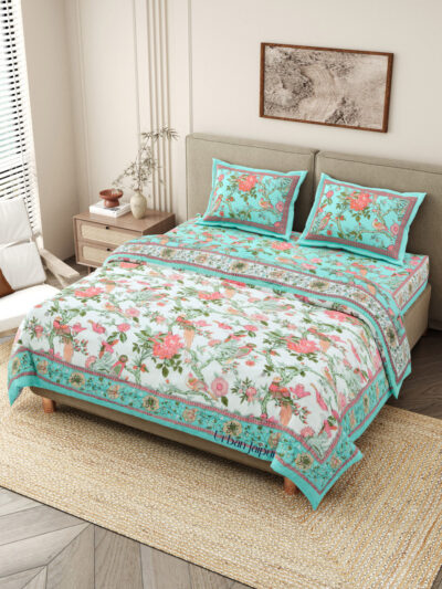 Quilt bedding set with bedsheet annd razai - one bedsheet with 2 pillow covers and 1 quilt in pink color in sky blue and white reversible pattern