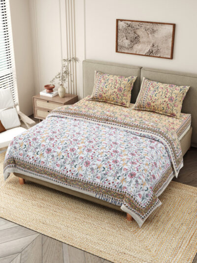 Quilt bedding set with bedsheet annd razai - one bedsheet with 2 pillow covers and 1 quilt in pink color in mustard and white reversible pattern