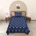 single blue and white bedsheet with an elegant floral pattern