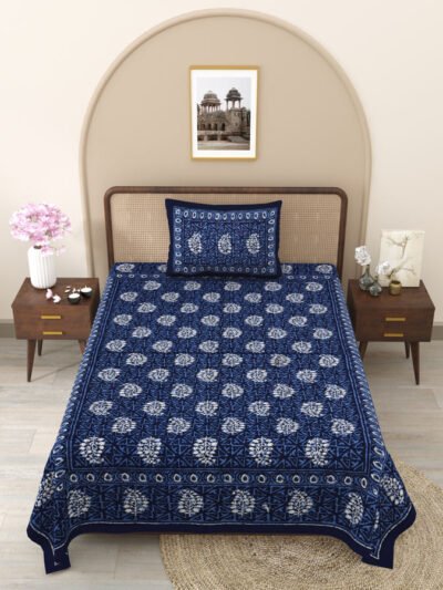 single blue and white bedsheet with an elegant floral pattern
