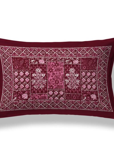 Red and white floral-patterned pillow