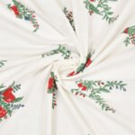 close up view of red and green floral bedsheet