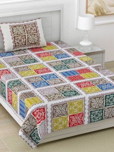 Light blue single bed sheet with a Barmeri patchwork design featuring geometric shapes and elephant motifs in shades of blue, green, and yellow. The bed sheet has end-to-end stitching.