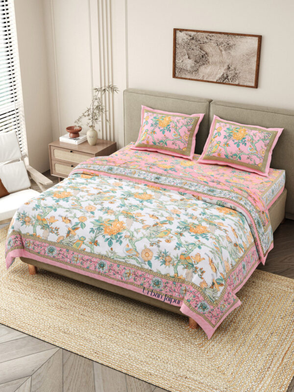 Quilt bedding set with bedsheet annd razai - one bedsheet with 2 pillow covers and 1 quilt in pink color